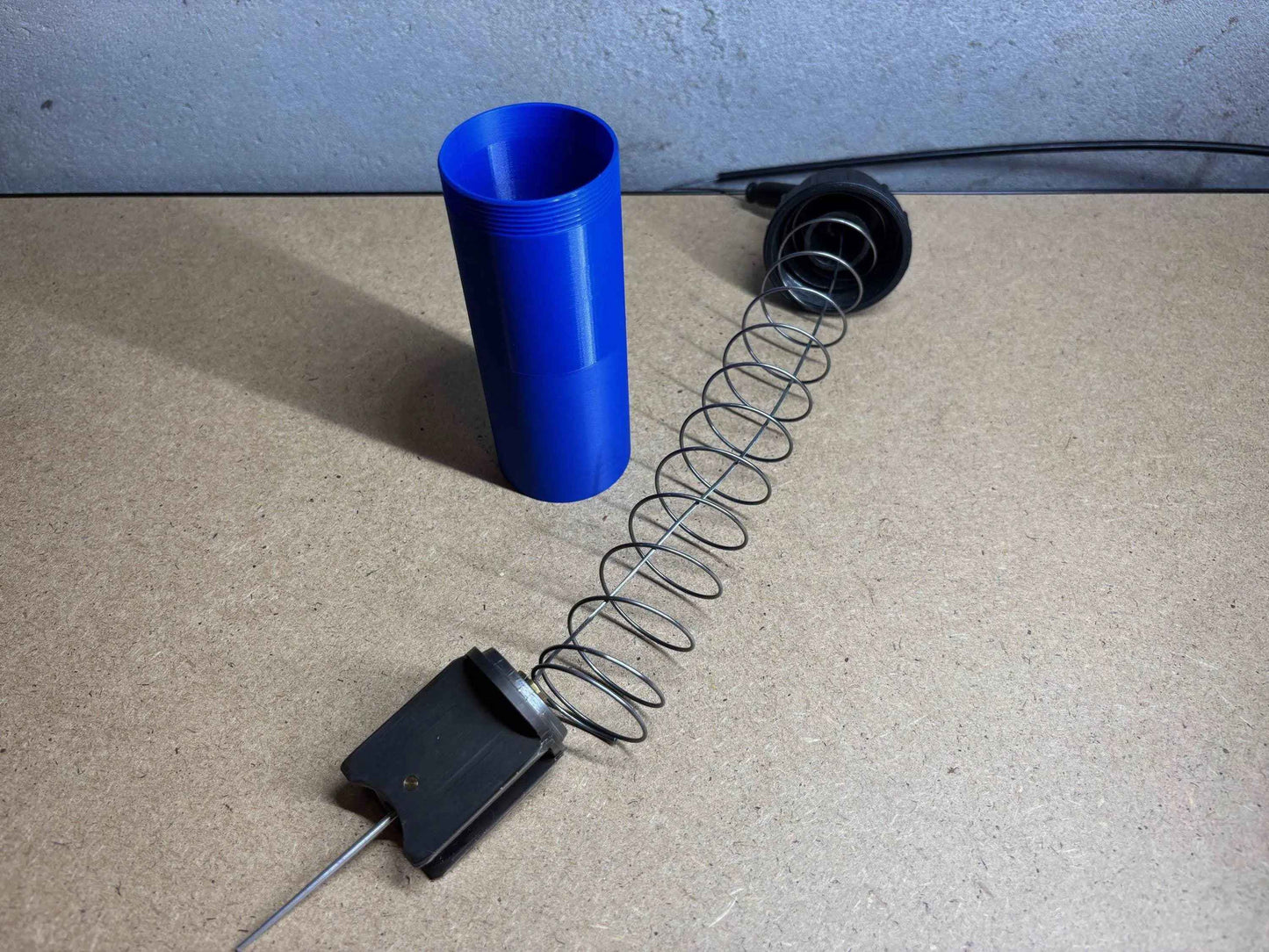 Rangement pour boisseau carburateur de karting